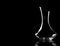 Glass wine decanter with black background