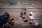 Glass with wine sediment and grape on dark wooden background top view copyspace