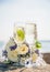 Glasses of champagne against the background of the sunny sea landscape