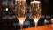 Glasses with champagne with Bubbles Rising Up on unfocused background