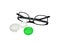 Glasses and contact lenses container on white background