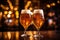 Glasses of craft beer. Two glasses of light beer against a beautiful bokeh background