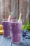 Glasses of delicious blueberry smoothie