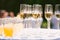 Glasses with different alcohol and nonalcohol drinks: champagne and juice