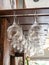 Glasses hang over the bar counter. The glasses are turned upside down. restaurant interior. Concept of drinking alcoholic