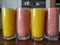 Glasses of healthy colorful nutritious fruit smoothies protein shake placed in the kitchen
