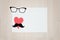 Glasses, heart, mustache on wooden background. Happy Father`s day background