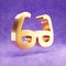 Glasses icon. Gold glossy Glasses symbol isolated on violet velvet background.