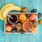 Glasses of juise with fruits on table