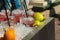 Glasses with multi-colored smuz and tubules on a counter of street trade