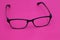 Glasses on the pink scene