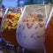 Glasses with punch of various colorful and fruits