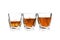 Glasses of scotch whiskey on white background