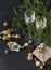 Glasses of sparkling wine, fir branches, chocolates with Golden wrappers, gift box, Golden balls, champagne, Christmas decor