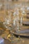 Glasses of water, wine and champagne arranged on a wedding reception