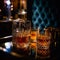 Glasses of whiskey close-up. Product photography. Glass of old whiskey standing on a table in a luxury bar. Composition of whiskey