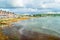 The glassy sea lapping at Swanage Bay