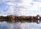 Glassy surface of the water, reflection clouds in water