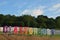 The Glastonbury Festival sign with a blue sky and white clouds behind