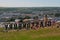 Glastonbury Festival, Somerset, UK. Behind the Glastonbury sign looking across the festival