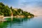 Glavanovo beach in Rijeka, Croatia with steep cliffs and lush green trees