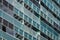 Glazed balconies of the facade of an urban building