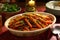 glazed carrots dished up on a table setting