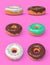 Glazed colored donuts set.