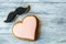 Glazed cookie shaped as heart.