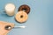Glazed donuts, milk, spoon and napkin on a blue background