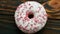 Glazed doughnut with pink sprinkles