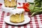 Glazed easter cake on squared table cloth