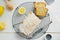 Glazed lemon pound cake loaf with poppy seed on cooling rack