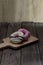 Glazed mini donuts on wooden background