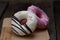 Glazed mini donuts on wooden background