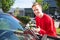 Glazier repairing windscreen after stone chipping damage