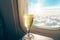 Gleaming Glasses with champagne on airplane flight. Generate ai