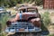 GLENDALE, UT - JUNE 20, 2018: Car wreckages with rust, abandoned vehicles