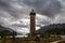 Glenfinnan Monument and Loch Shiel lake. Highlands Scotland Uk