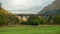 Glenfinnan, United Kingdom - 17 OCTOBER 2019 : Jacobite steam train crossing famous viaduct in Scottish Highlands.