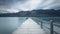 Glenorchy wharf wooden pier and lamp after sunrise, South island of New Zealand