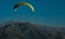 Glider on a background of mountains and sky