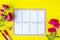 Glider with notes and to-do list on a yellow background with pink stationery and flowers. Business concept. Top view