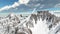 Glider over snow covered mountains