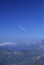 Glider plane turning over Pyrenees mountain