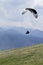 Glider takes off over the mountains