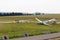 Gliders sailplanes ready for takeoff on Wasserkuppe airfield in Rhön Mountains