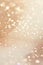 Glimmering golden bokeh on a creamy background, ideal for festive occasions, luxury branding, soft-focus backdrops, or