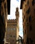 Glimpse from an alley of the old palazzo tower in Florence in It