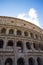 Glimpse of the Colosseum in Day light, in Rome